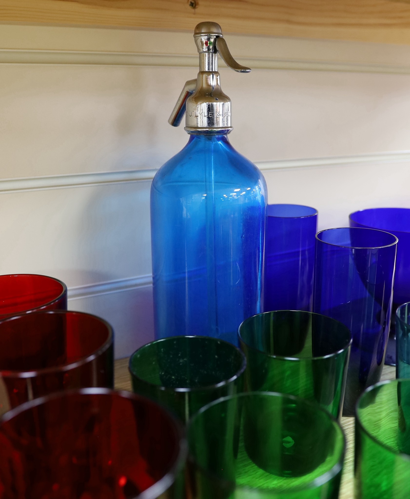 A mixed selection coloured glass wares